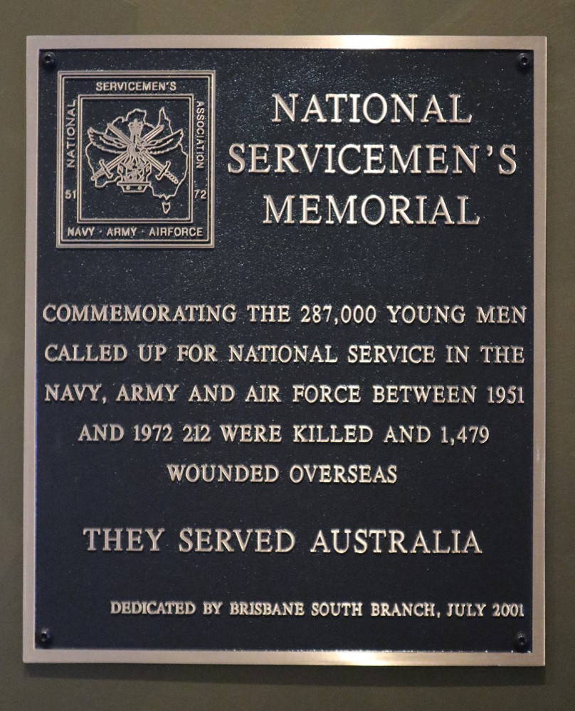 A plaque saying "National Servicemen's Memorial" commemorating the 287 000 young men called up for national service