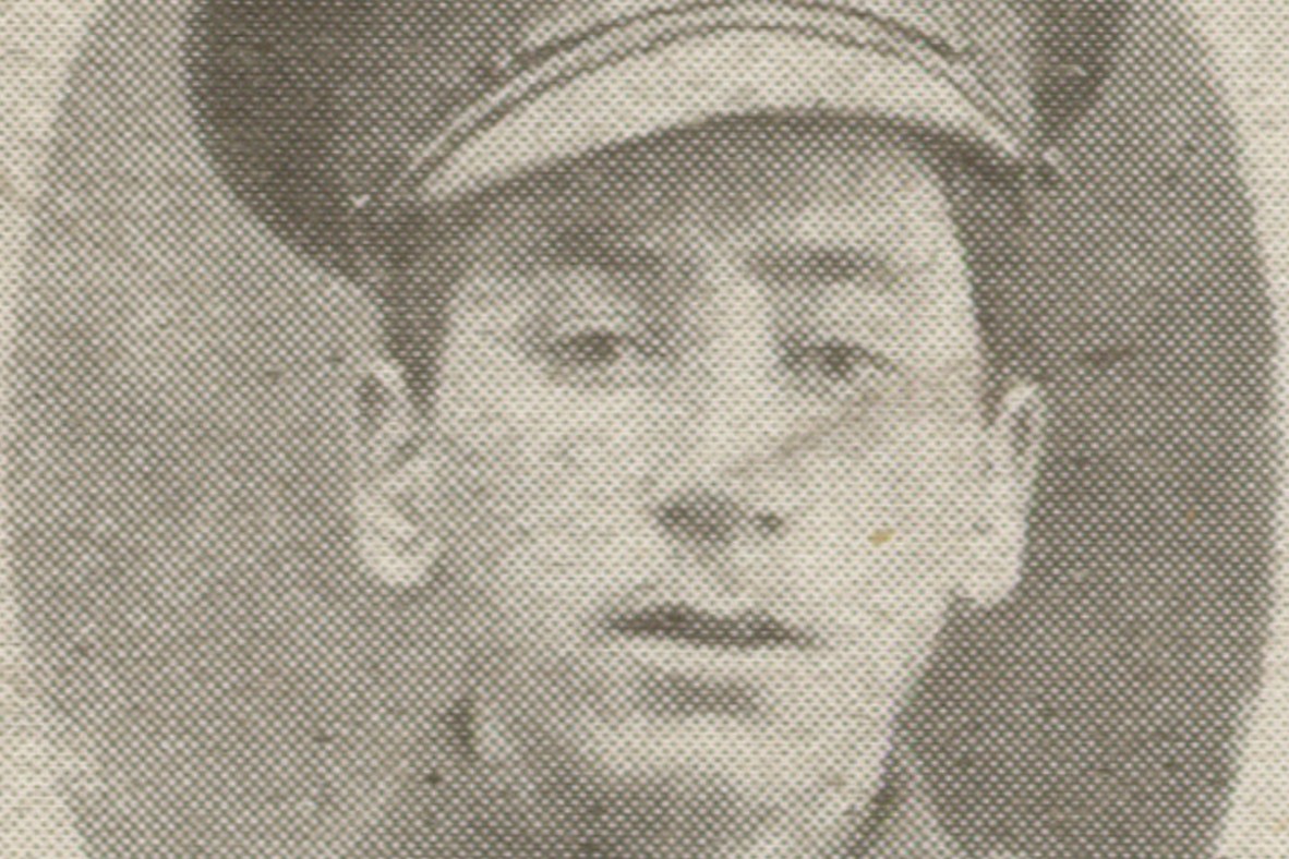A black and white photograph of a young soldier