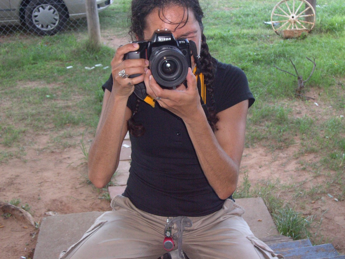 Jo-Ann Driessens taking photographs in Woorabinda, Queensland. 