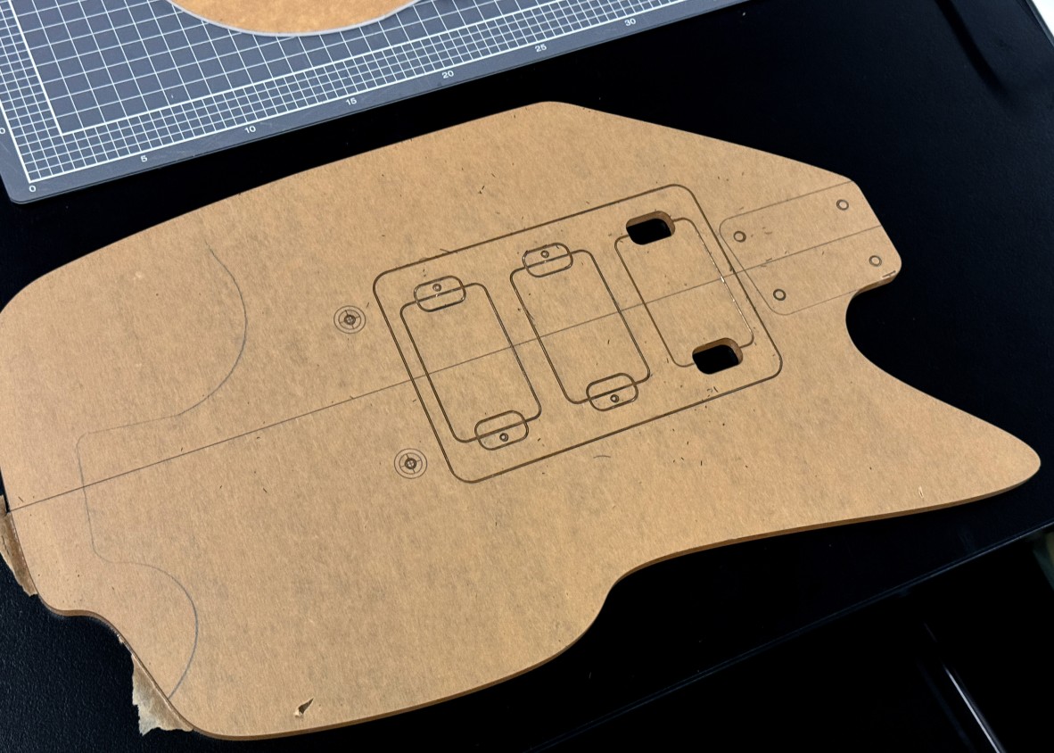 A photo of a custom guitar being made