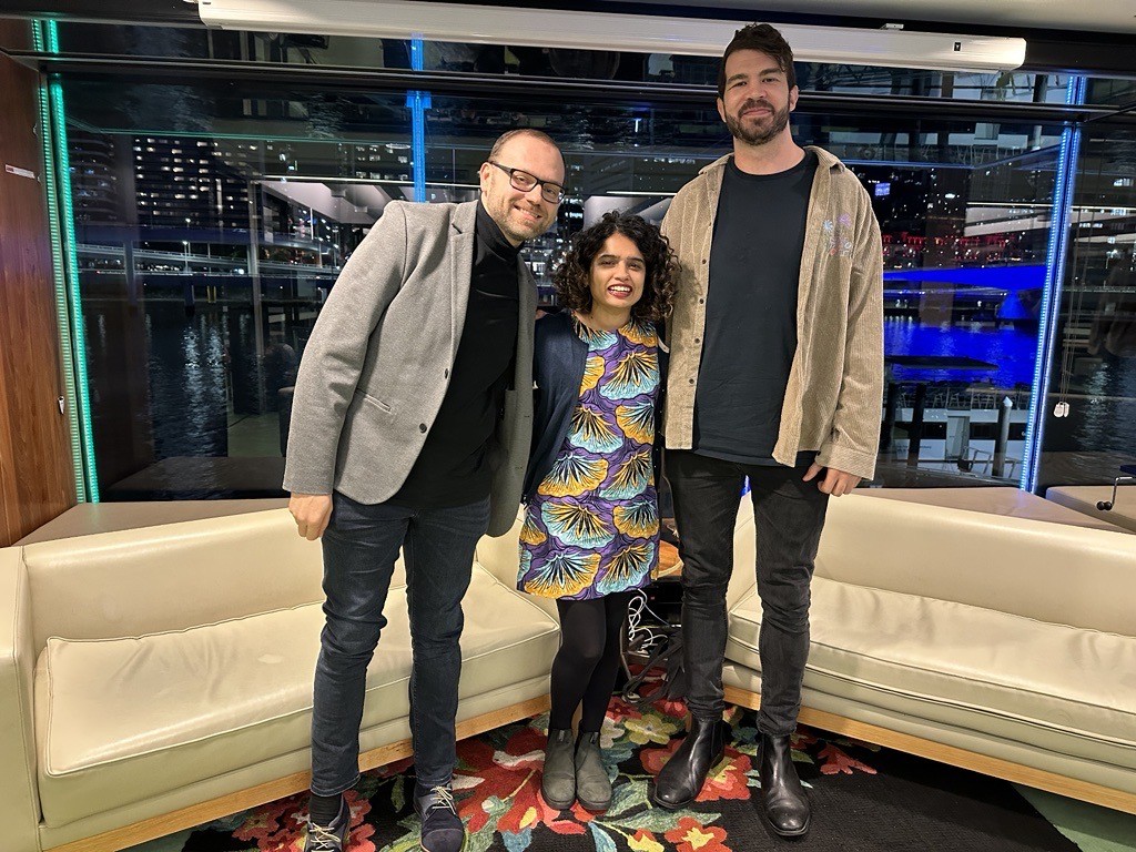 Image of 3 people standing together at The Edge
