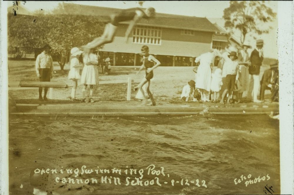 Young man diving into the Cannon Hill State School swimming pool at its opening, Brisbane, 1922