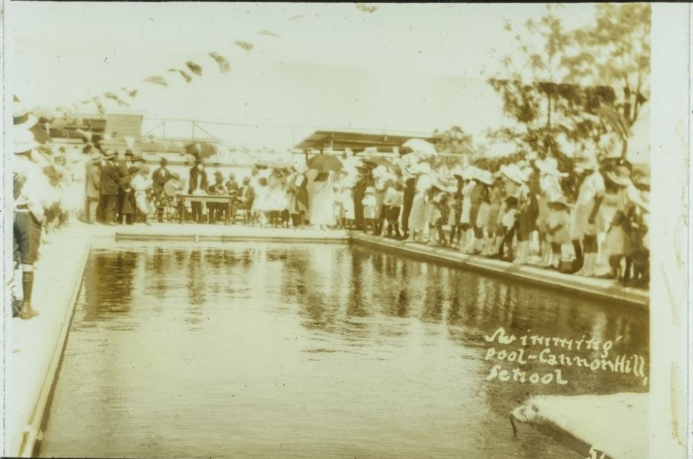 Crowd gathers around the opening of the Cannon Hill State School swimming pool, 9 December 1922. John Oxley Library, State Library of Queensland