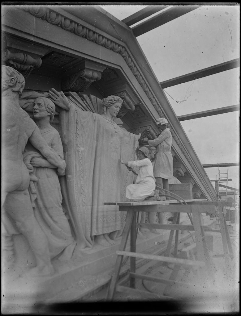 Daphne Mayo working with John Theodore Muller on the central figure of the Brisbane City Hall tympanum 1930