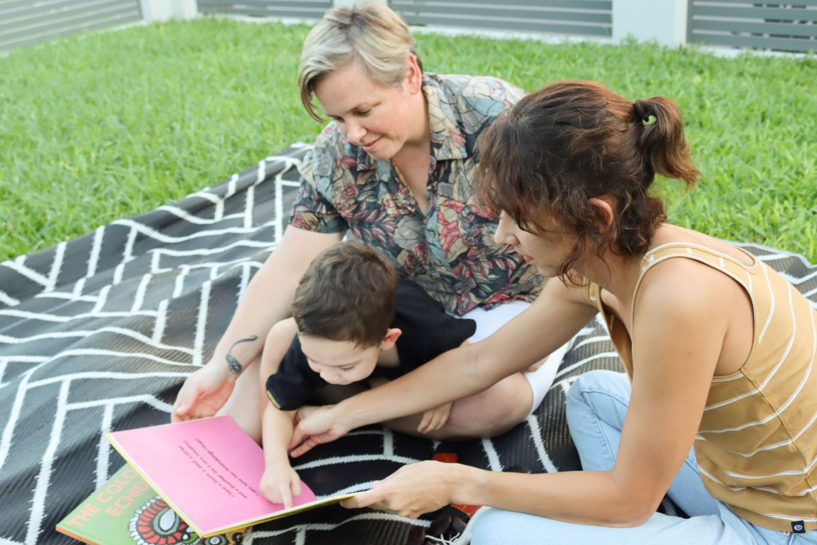 Adults and children reading