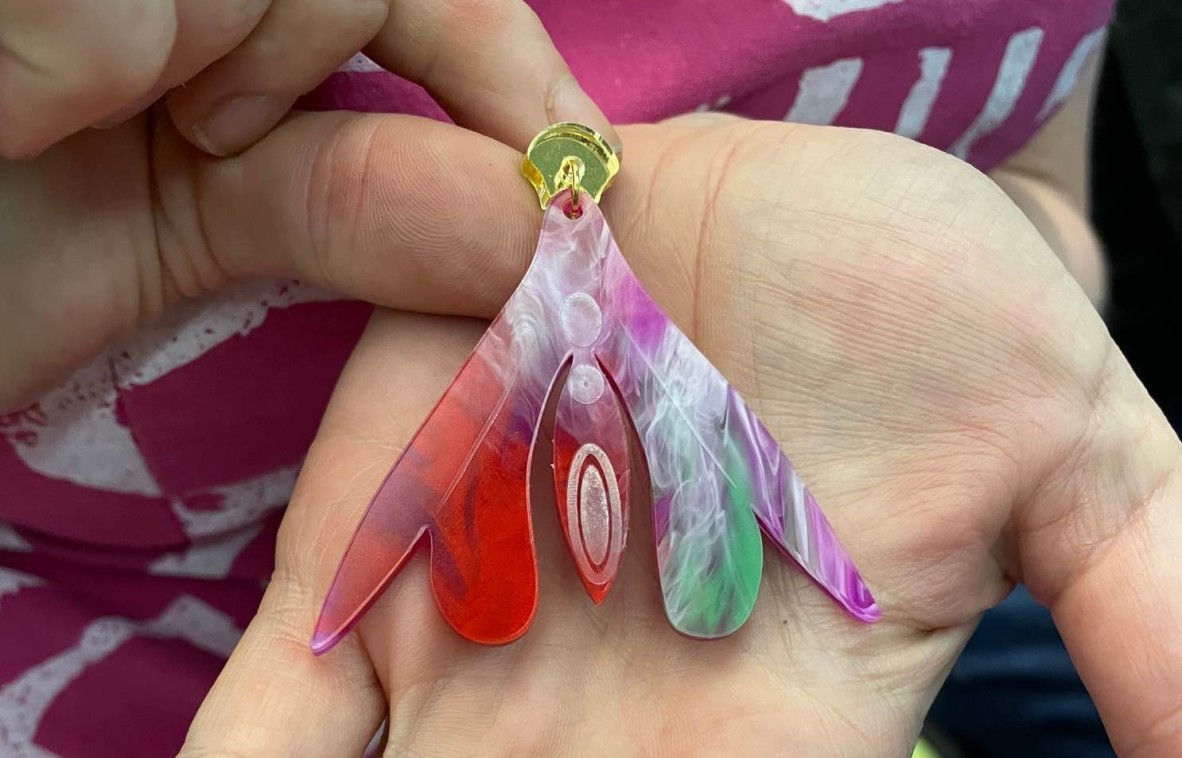 female anatomical laser cut earrings