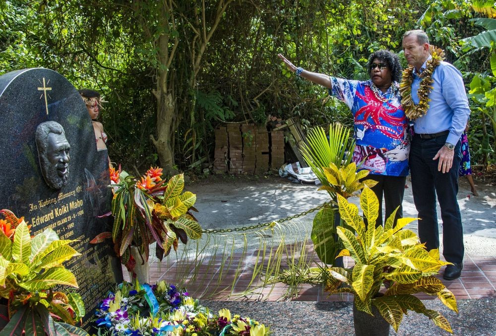 Prime Minister Tony Abbott stands with Gail mabo