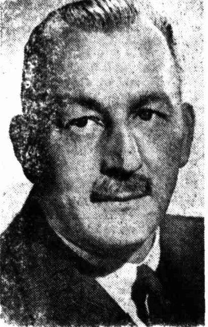 Black and white photograph of George Caiger