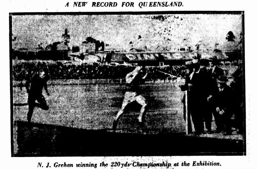 Runner Norm Grehan crossing the finishing line first during the 220 yards Championship at the Brisbane Exhibition