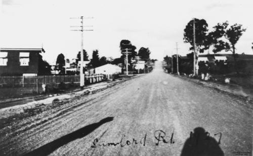 View along unsealed road, Mitchelton, Brisbane, 1927, John Oxley Library, State Library of Queensland, Image No: 16226