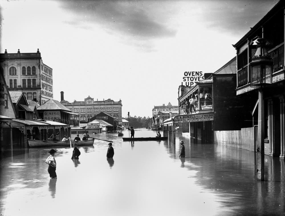 people stand in floodwater in Brisbane city, 1893 