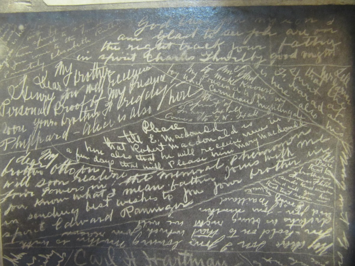 Photograph of spirit slate-writing which occurred during a séance in Brisbane on 24 October 1888.