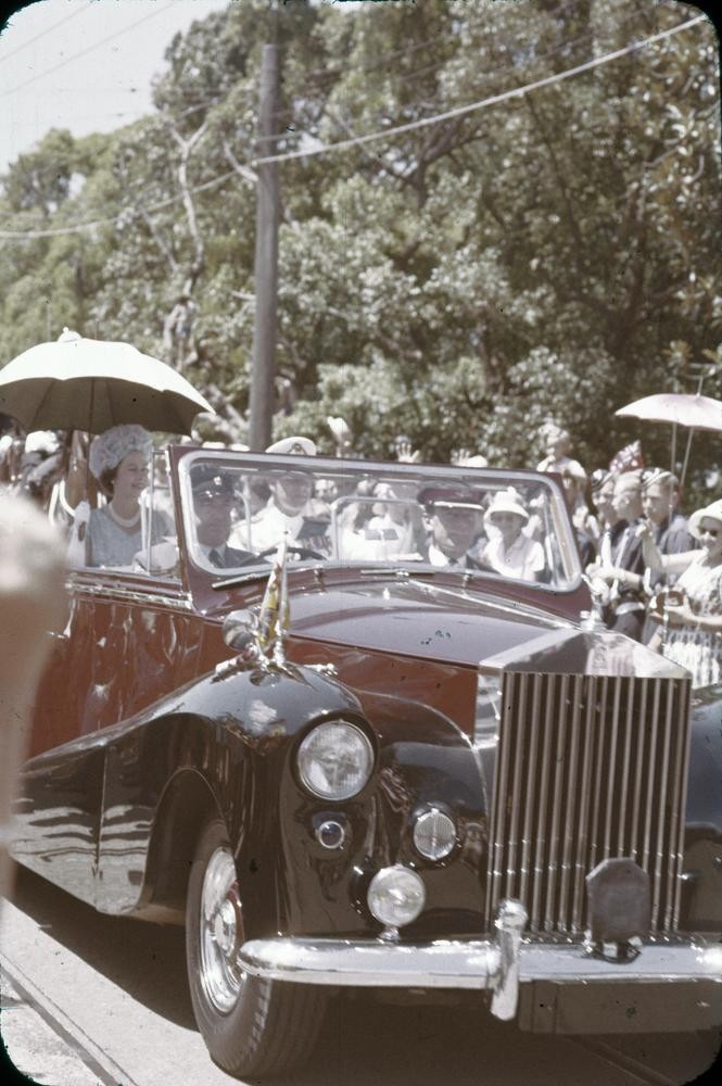 Queen Elizabeth II rides in a Rolls Royce during her visit to Brisbane 1954