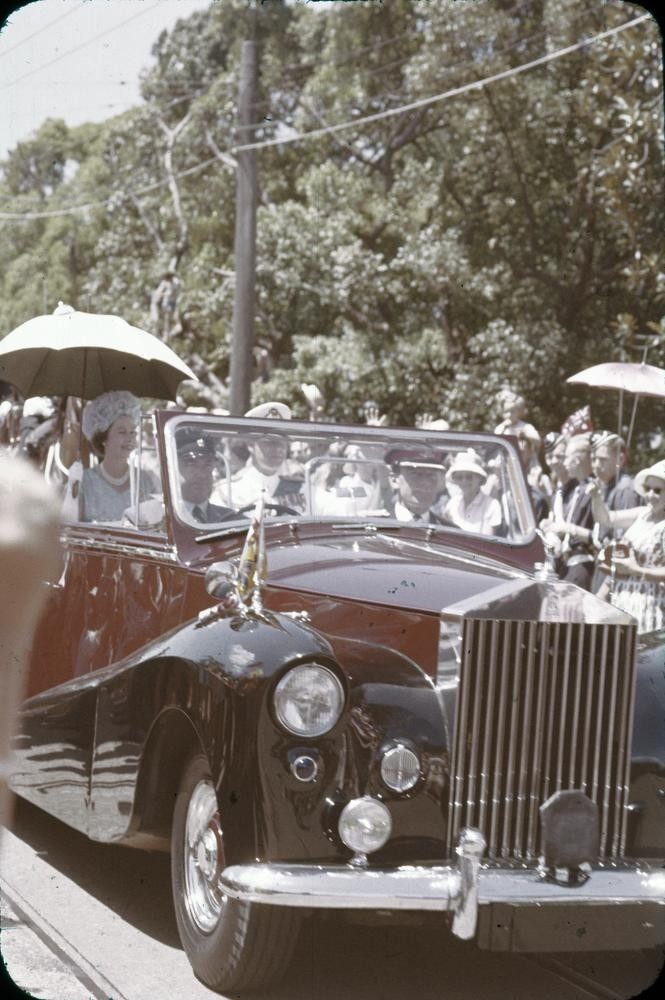 Queen Elizabeth II rides in a Rolls Royce during her visit to Brisbane, 1954