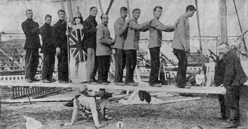 Herr Pagel supporting Mrs Pagel and nine men on a plank. Wirth's Circus, Brisbane, 1903.