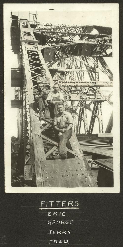 Bridge fitters posing on the framework of the Story Bridge, Brisbane, ca. 1939. 