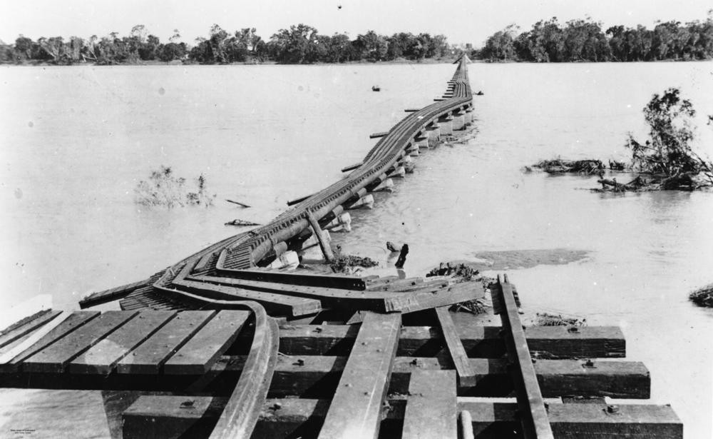 Flood damaged railway bridge over the Burdekin River 1917.