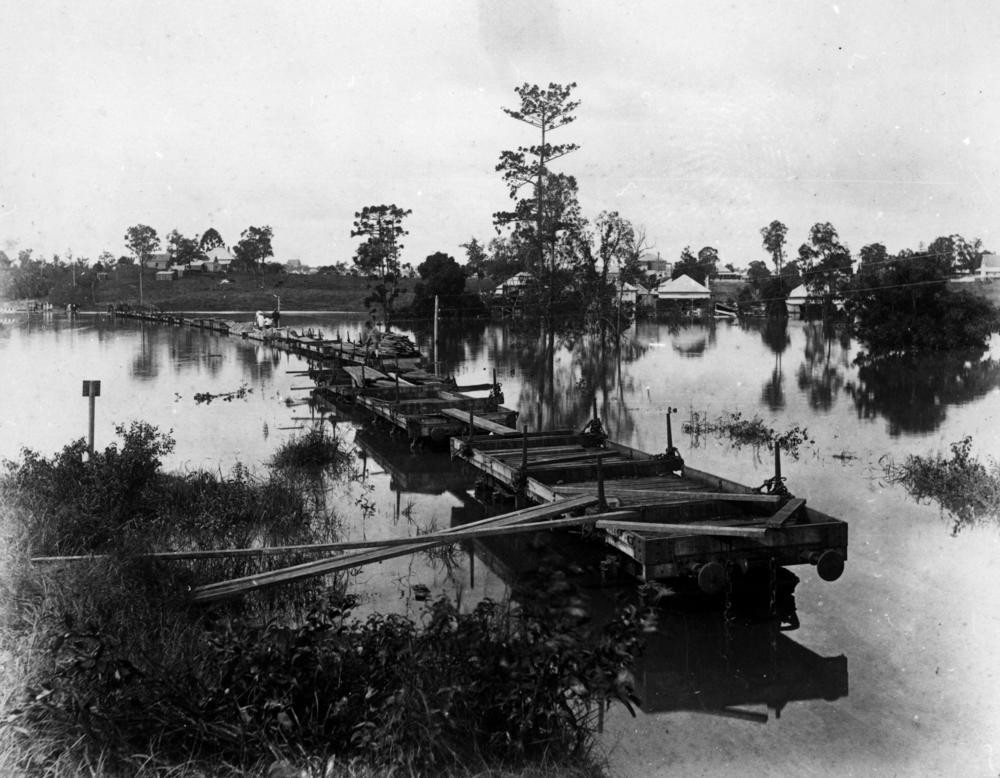 Makeshift bridge of railway wagons during the 1890 flood in Auchenflower Brisbane 