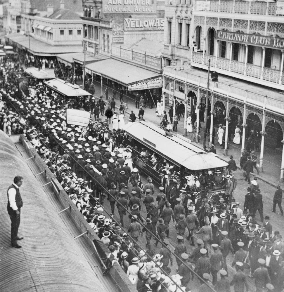 Dungarees marching along Queen Street Brisbane 1915 John Oxley Library State Library of Queensland Neg 24828 