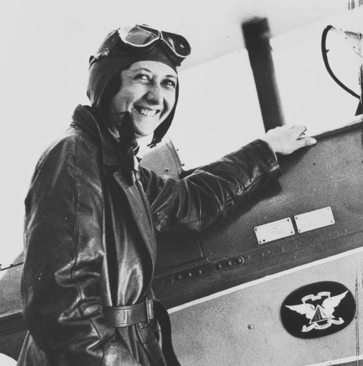 Aviatrix Lores Bonney boarding her Gypsy Moth at Charleville, ca. 1933.