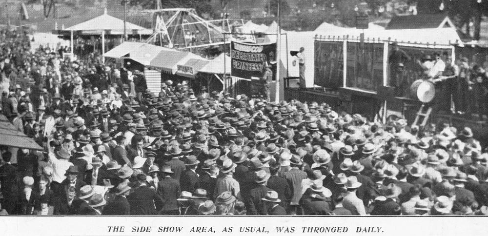 Crowd gathers in sideshow alley Brisbane Exhibition Grounds 1933