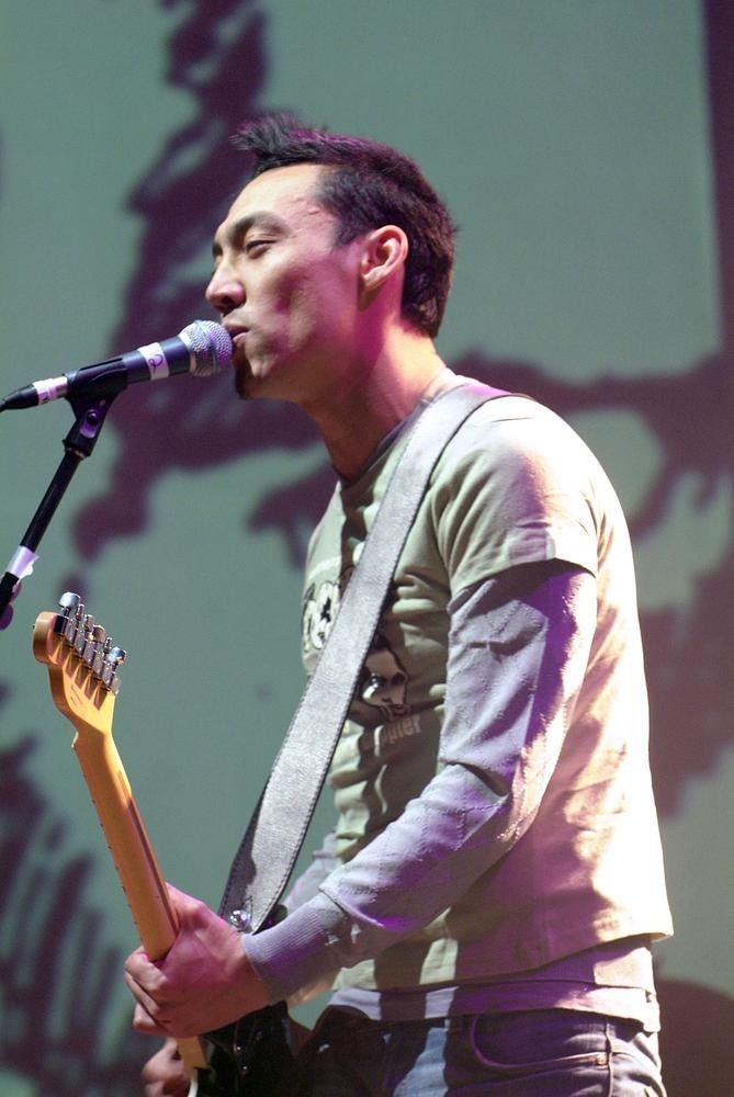 Quan Yeomans from Regurgitator at the Pig City Concert, Brisbane, July 2007. John Oxley Library, State Library of Queensland. Image 7336-0001-0299