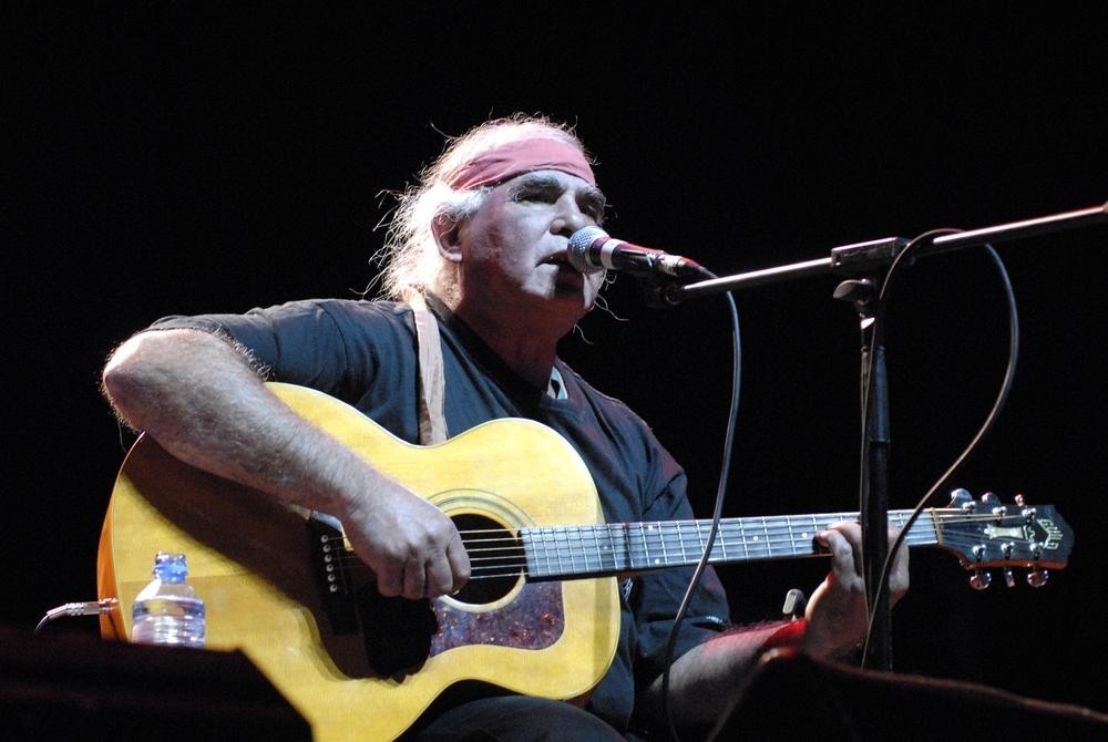 Kev Carmody performing at the Pig City Concert, Brisbane, July 2007. John Oxley Library, State Library of Queensland. Image 7336-0001-0178