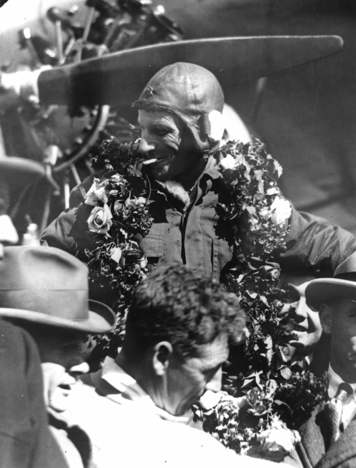 Relaxed portrait of Sir Charles Kingsford-Smith on arrival in Brisbane in 1928 after his record breaking flight. 