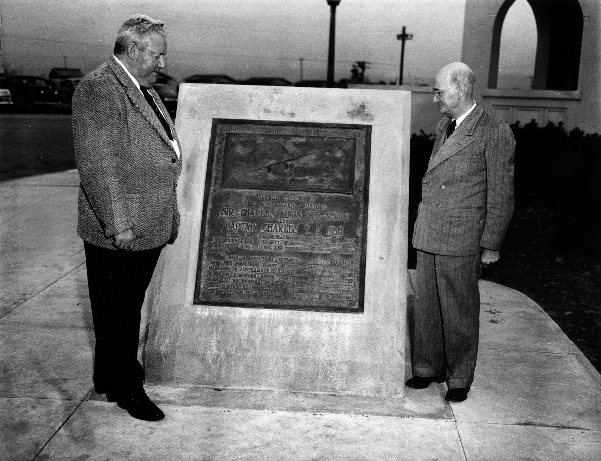 Brisbane Mayor, Sir John Chandler (right) inspecting Sir Charles Kingsford Smith's Memorial at Oakland Airport in California, 1947.