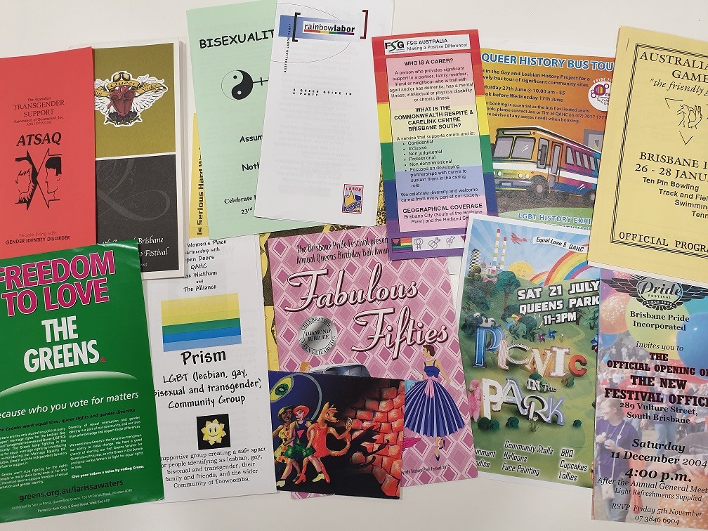 Photo of various ephemera items including brochures, pamphlets and programs.