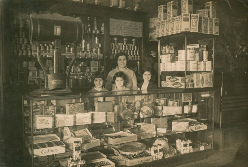 Irene Andronicus with her children Katie Ada and Mary behind Cafe Mimosa Counter Maryborough 1930