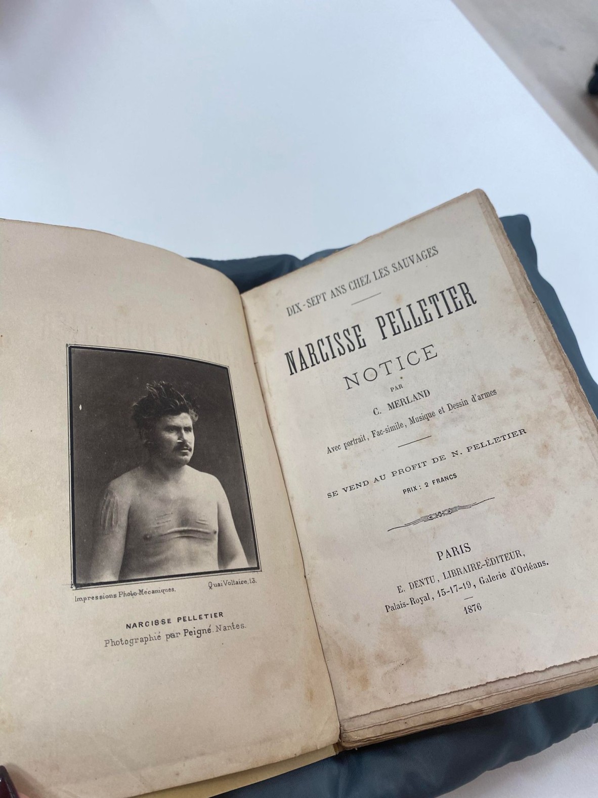 title page of the book of Narcisse Pelletier, including portrait of him featuring his scars