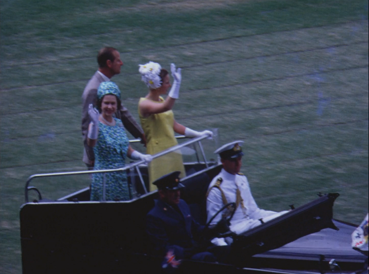 Queen Elizabeth II and Prince Philip wave to the Brisbane crowd during the 1970 Royal Tour