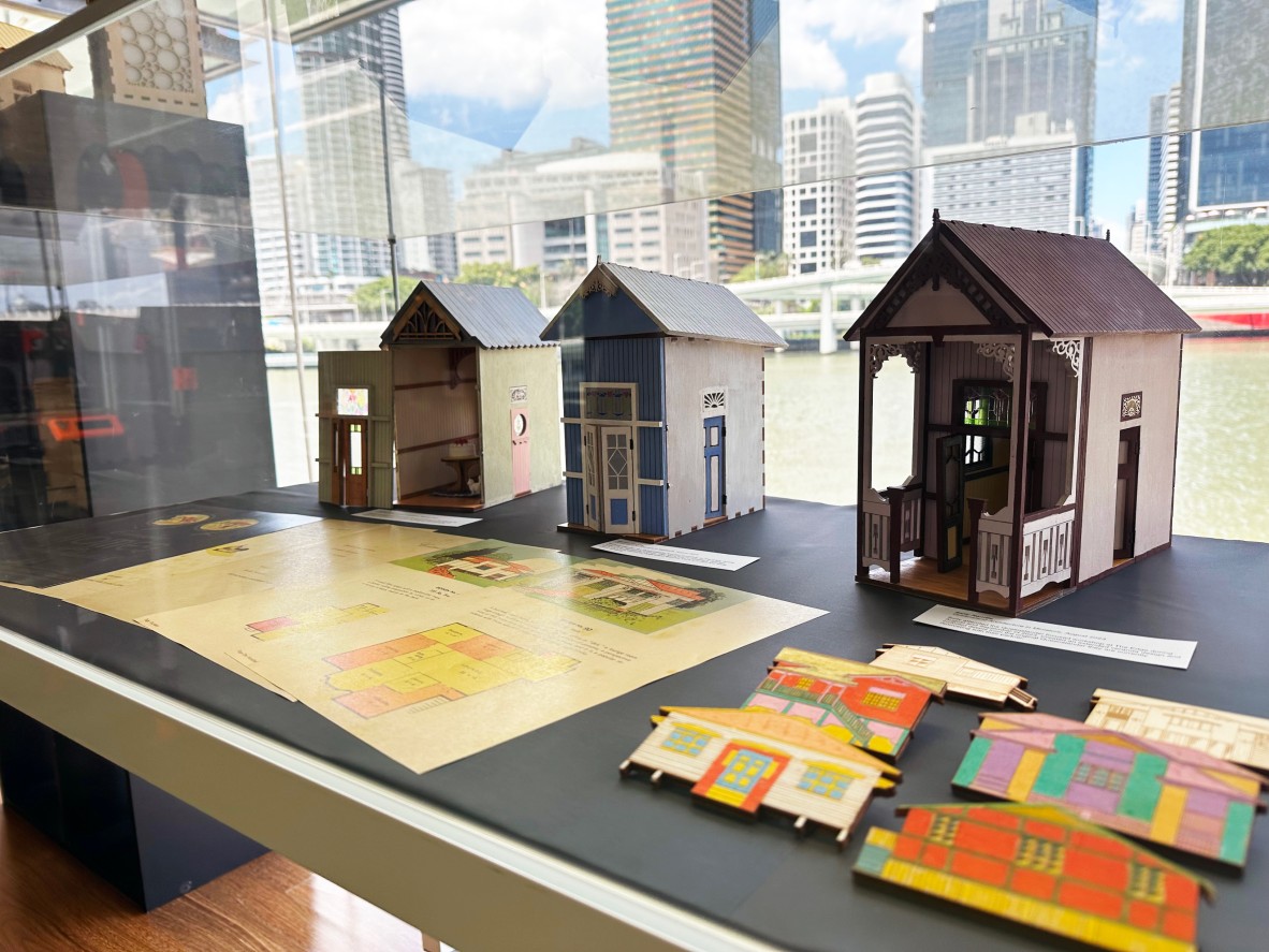 A row of queensland in miniature book nooks. With some pages from the 99 Everyday Homes book.