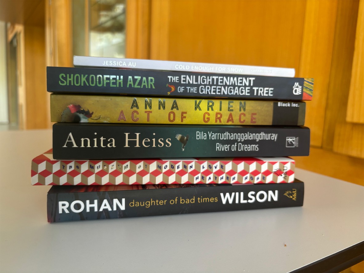 A stack of books including Daughter of bad times by Rohan Wilson, Act of Grace by Anna Krien, and Museum of modern love by Heather Rose