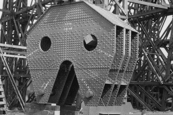 The Story Bridge under construction crossing the Brisbane River, 1939