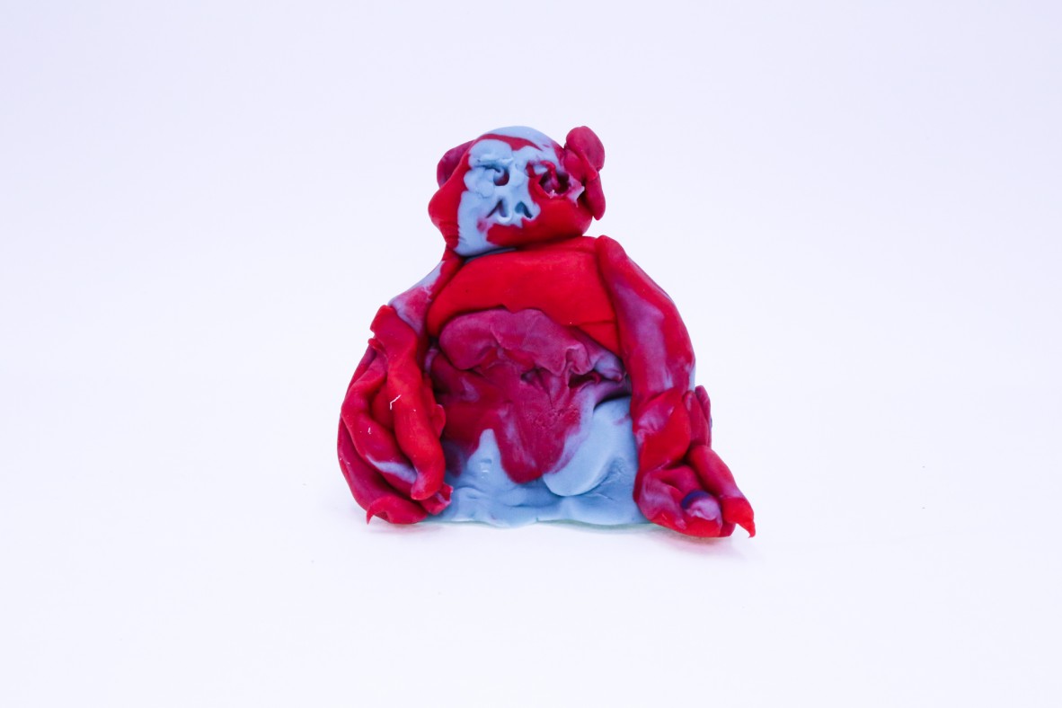 Frankenstein is a red and blue play-dough sculpture of a monster