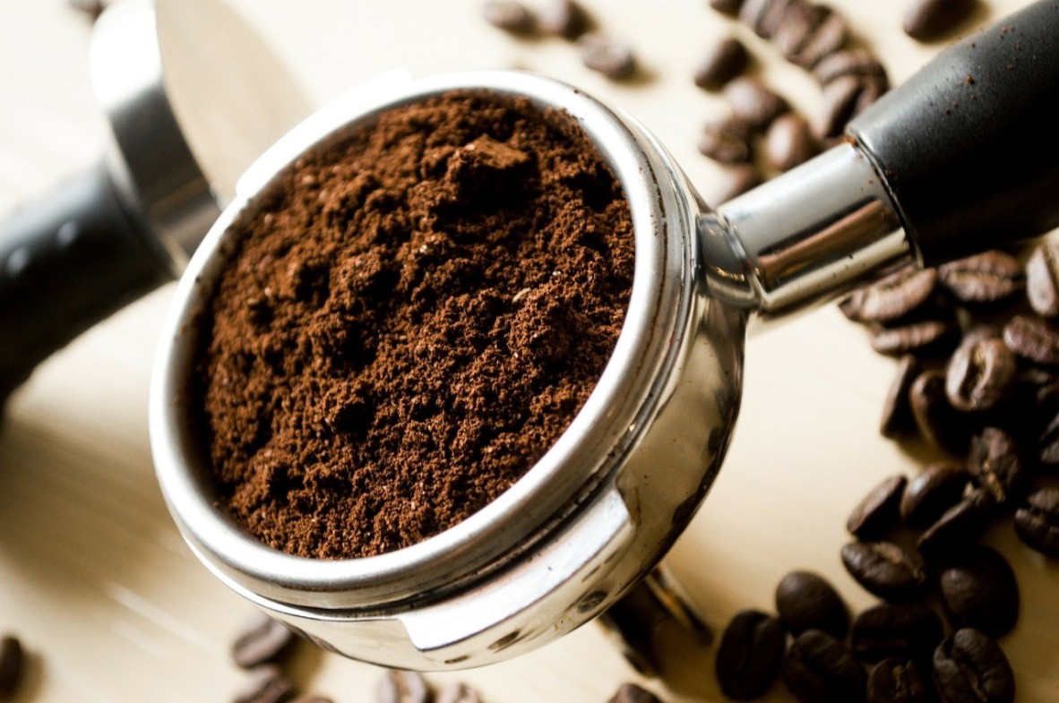 Image of coffee in a coffee grinder