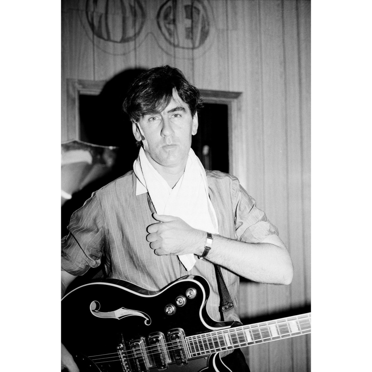 Robert Forster holding his guitar Zoo Nightclub in Brisbane 1995