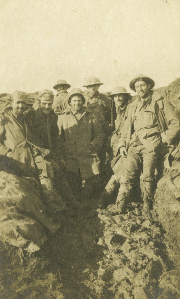Photograph M 767/11. Mallyon's field ambulancePhotograph M 767/11. Mallyon's field ambulance comrades in a muddy trench, France. comrades in a muddy trench, France.