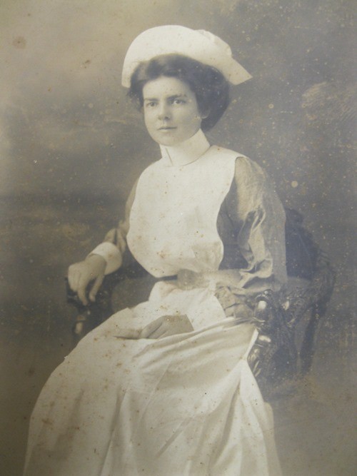 Portrait of a young Constance Keys sitting on a chair