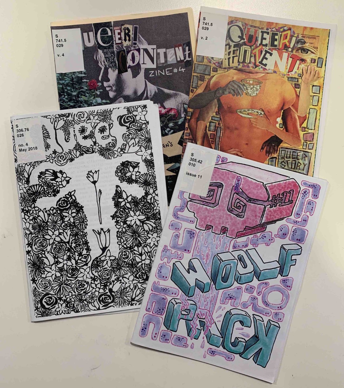 The covers of four LGBTQI+ zines from State Library of Queensland's collection